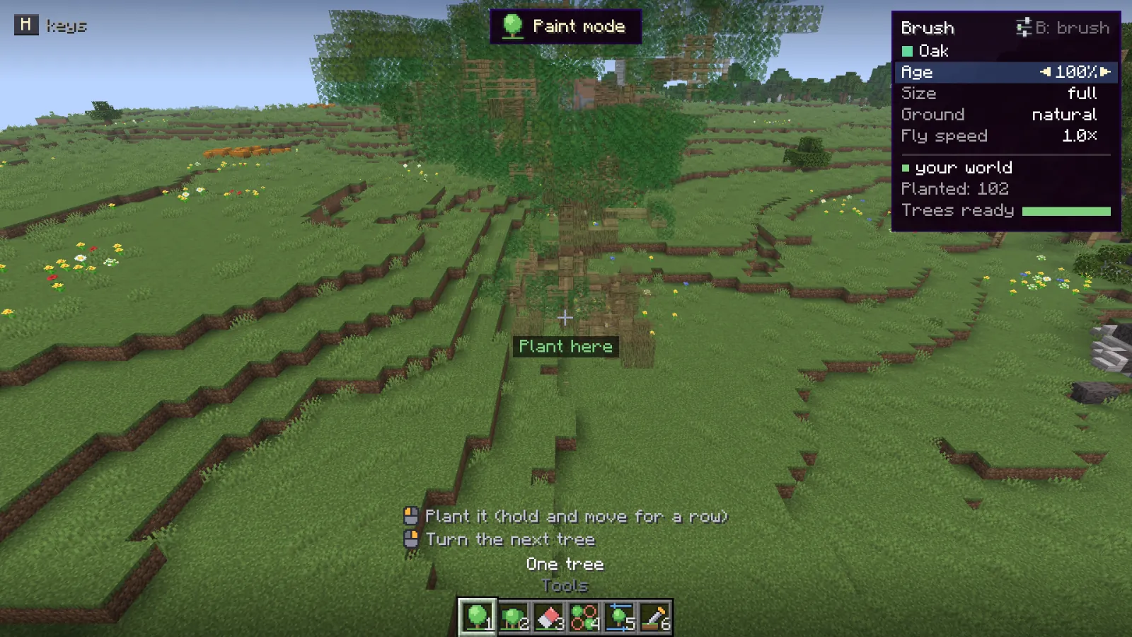 The next tree shown as a ghost at the crosshair in paint mode